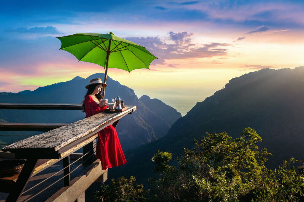beautiful girl making drip coffee sunrise viewpoint pha hi village chiang rai province thailand