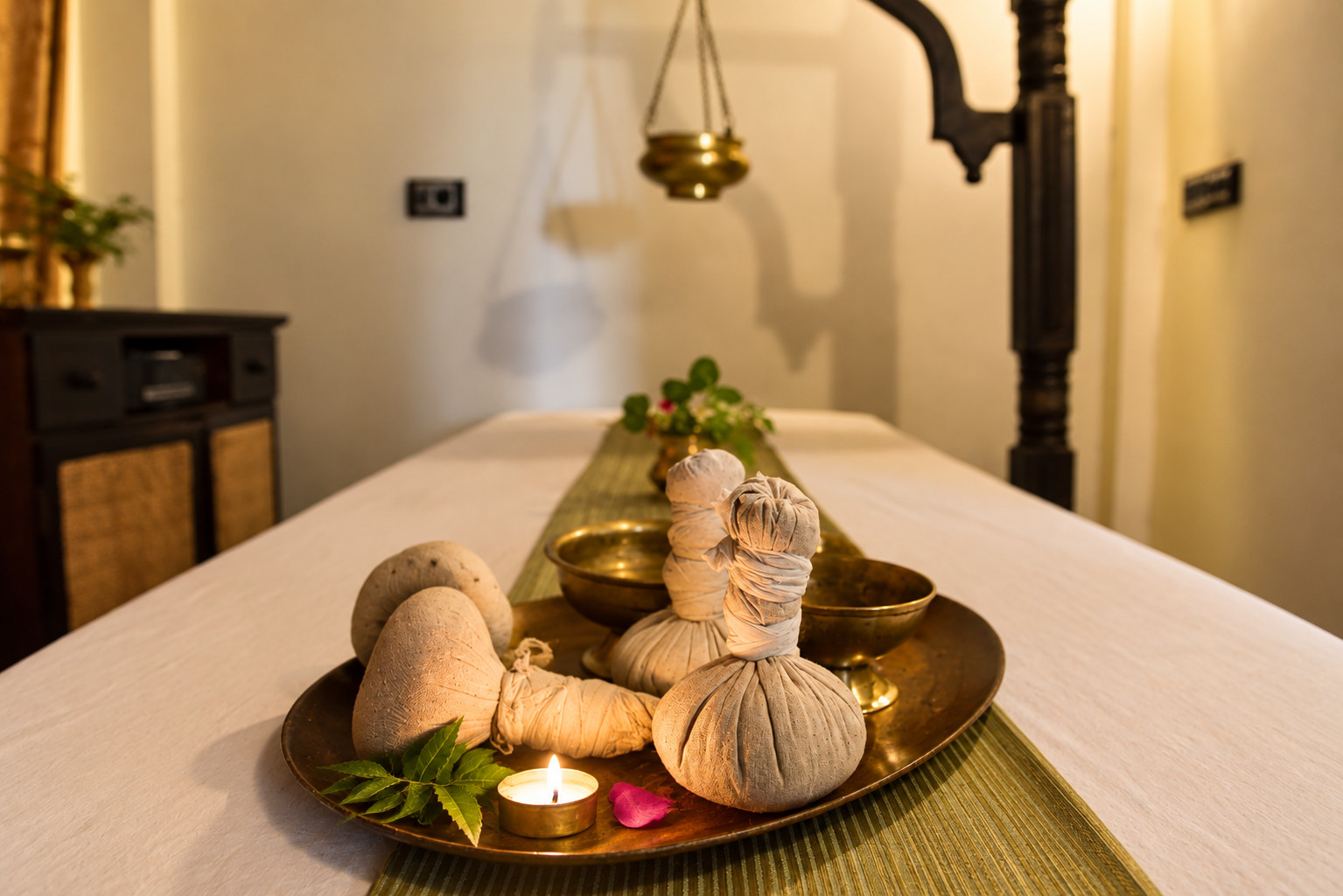 Podi Kizhi herbal compresses at Sisal Spa Blackberry Hills Munnar