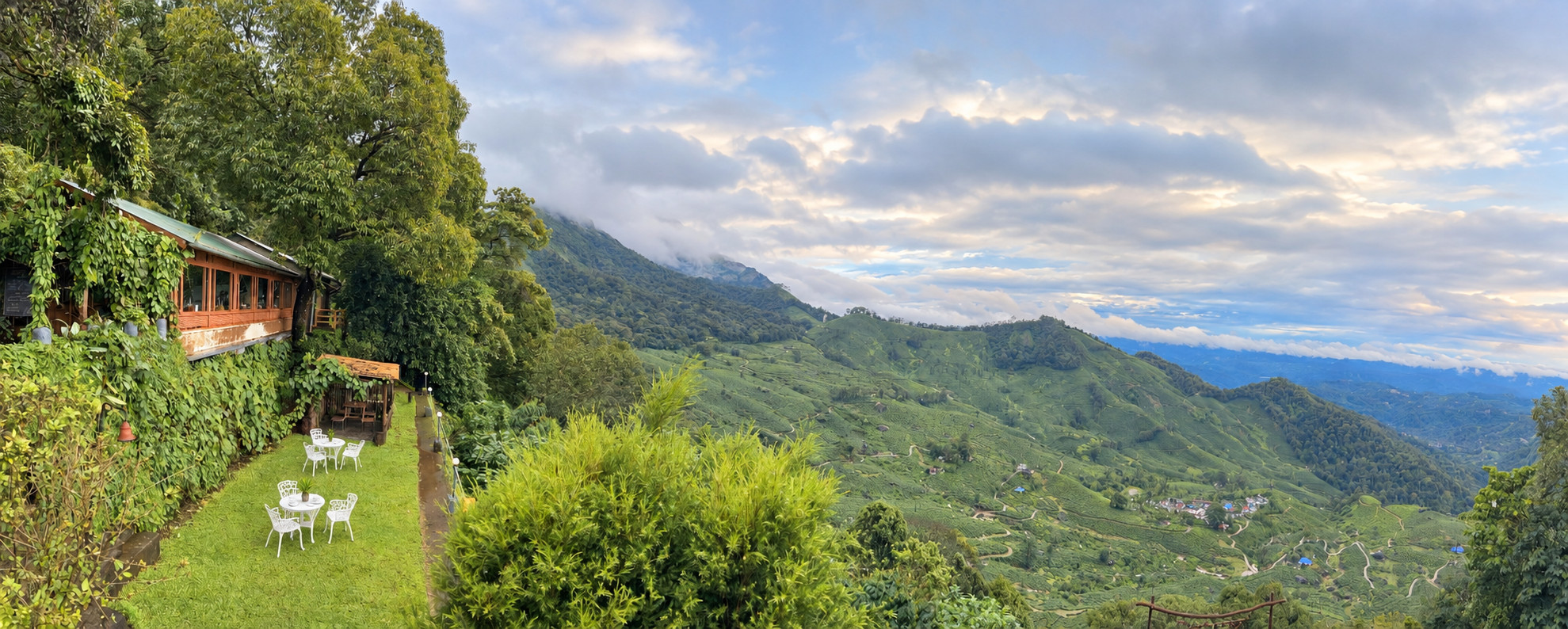 Hornbill Restaurant overlooking the green valley and Western Ghats at Blackberry Hills Munnar